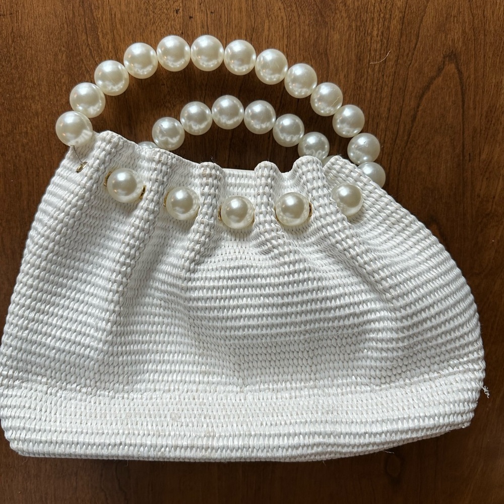 Melie Bianco woven vegan leathered bag with pearl handles